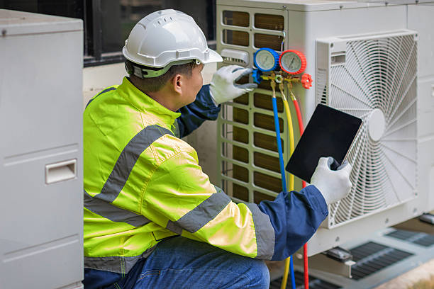 Professional Air Duct Cleaning technician working in Marion, IA
